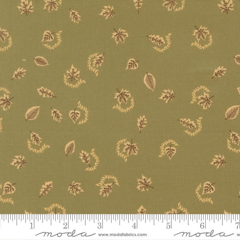 Image of Windfall Autumn Breeze Meadow quilting cotton fabric by Fancy That Design House for Moda Fabric. Features leaves on a green background. Cute Little Fabric Shop.