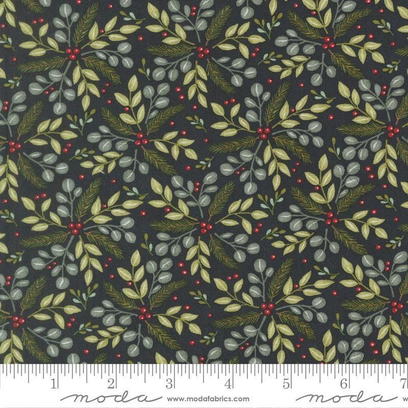 Image of When Snow Falls Winter Greenery Night Sky quilting cotton fabric by Deb Strain for Moda Fabrics. Features leaves on a blue background. Cute Little Fabric Shop.