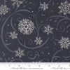 Image of When Snow Falls Swirling Snowflakes Night Sky quilting cotton fabric by Deb Strain for Moda Fabrics. Features snowflakes and swirls on a blue background. Cute Little Fabric Shop.