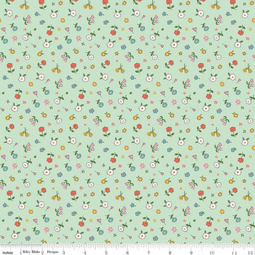 Image of Cotton Nook Pretty Mint quilting cotton fabric by Minki Kim for Riley Blake Designs. Features flowers on a green background. Cute Little Fabric Shop.