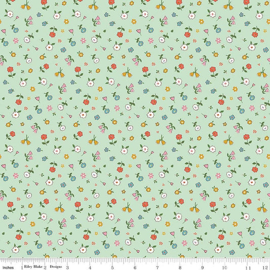 Image of Cotton Nook Pretty Mint quilting cotton fabric by Minki Kim for Riley Blake Designs. Features flowers on a green background. Cute Little Fabric Shop.