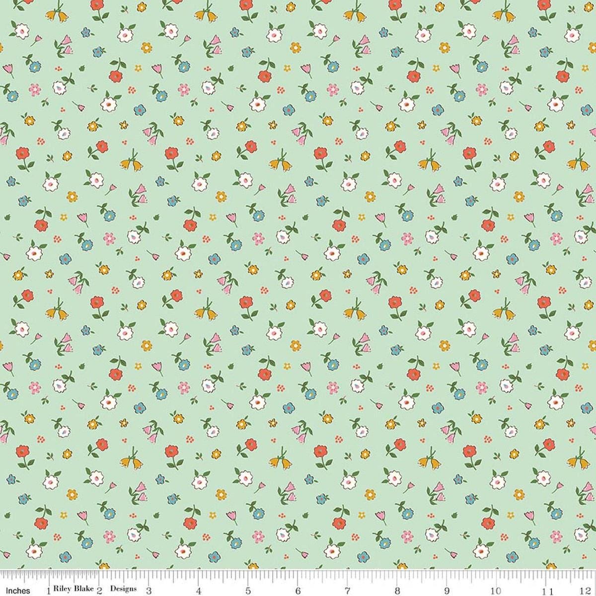 Image of Cotton Nook Pretty Mint quilting cotton fabric by Minki Kim for Riley Blake Designs. Features flowers on a green background. Cute Little Fabric Shop.