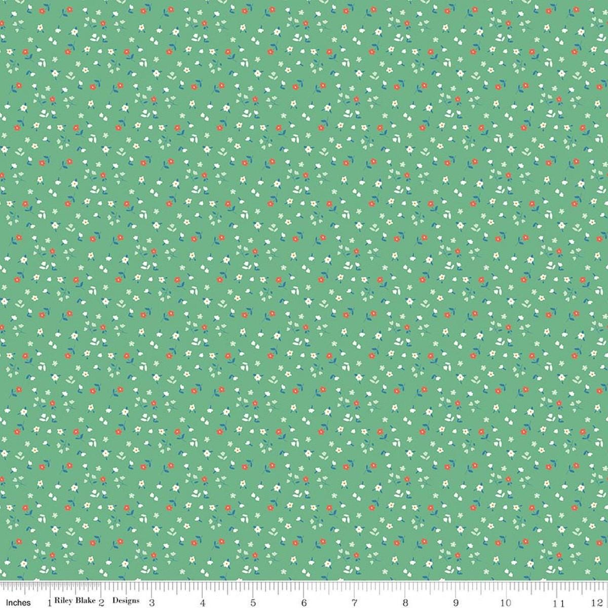 Image of Cotton Nook Flowers Green quilting cotton fabric by Minki Kim for Riley Blake Designs. Features flowers on a green background. Cute Little Fabric Shop.