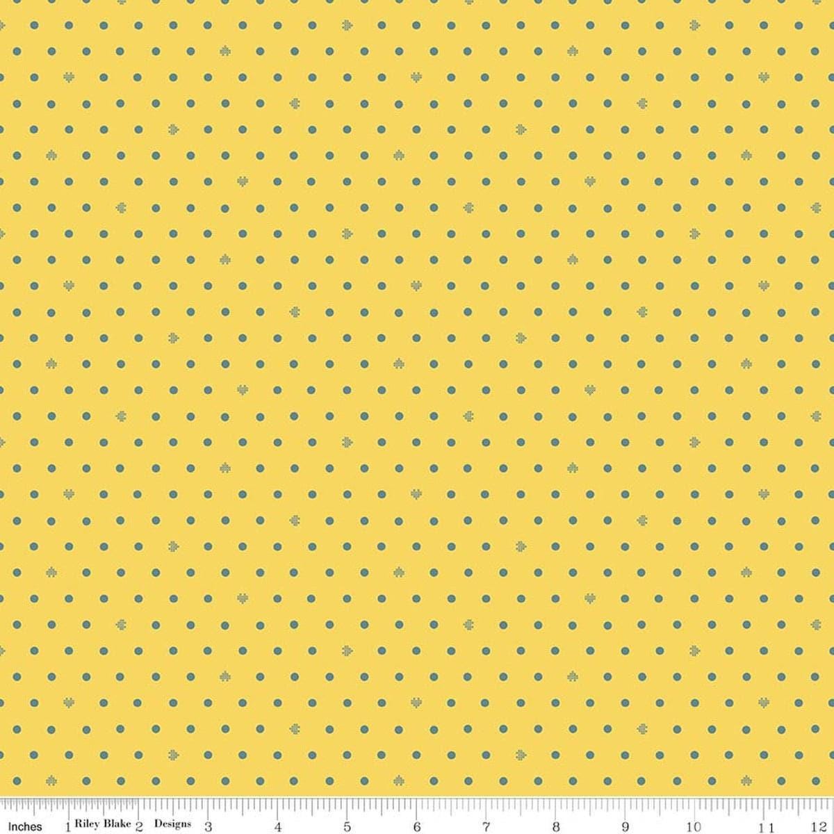 Image of Cotton Nook Dots Yellow quilting cotton fabric by Minki Kim for Riley Blake Designs. Features polka dots on a yellow background. Cute Little Fabric Shop.