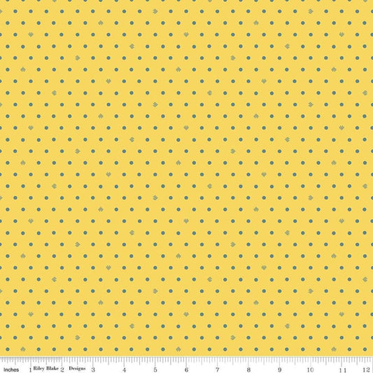 Image of Cotton Nook Dots Yellow quilting cotton fabric by Minki Kim for Riley Blake Designs. Features polka dots on a yellow background. Cute Little Fabric Shop.