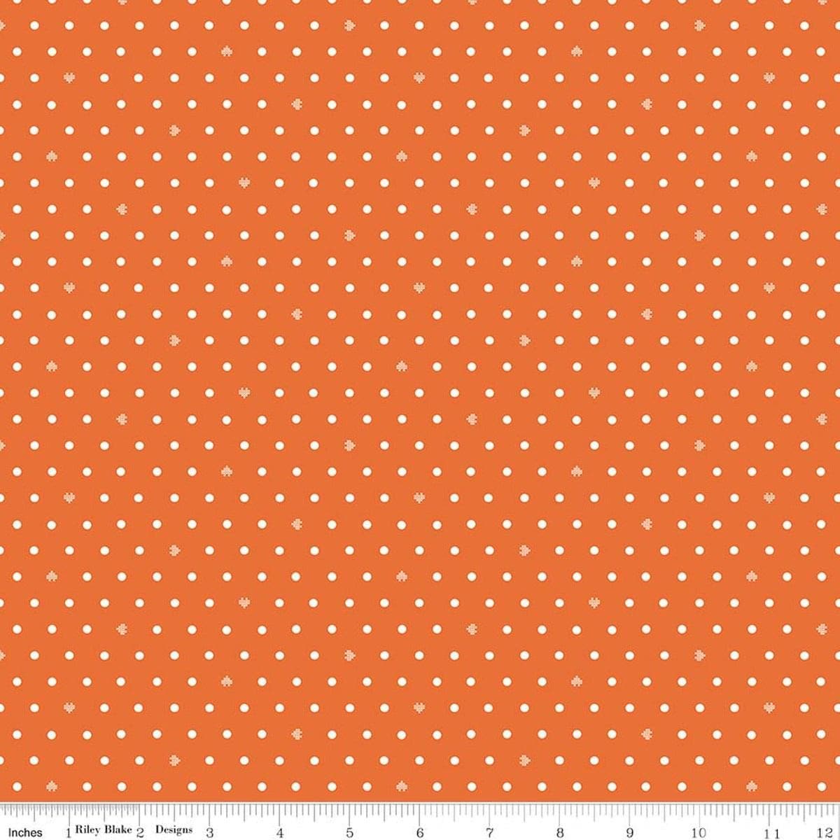 Image of Cotton Nook Dots Orange quilting cotton fabric by Minki Kim for Riley Blake Designs. Features polka dots on an orange background. Cute Little Fabric Shop.