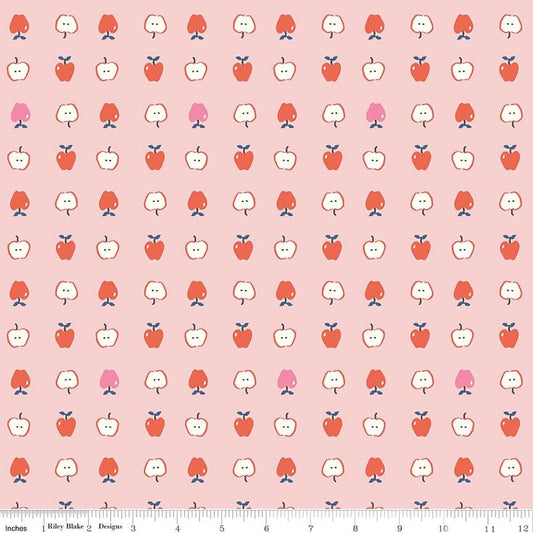 Image of Cotton Nook Apples Pink quilting cotton fabric by Minki Kim for Riley Blake Designs. Features apples on a pink background. Cute Little Fabric Shop.