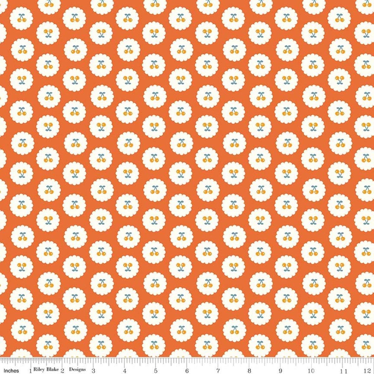 Image of Cotton Nook Cherries Orange quilting cotton fabric by Minki Kim for Riley Blake Designs. Features cherries on an orange background. Cute Little Fabric Shop.