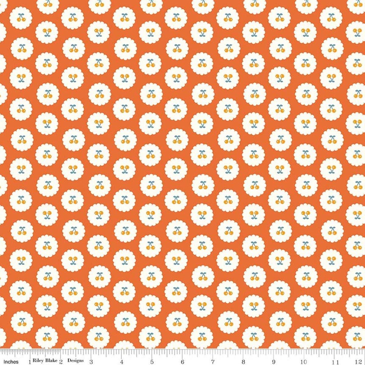 Image of Cotton Nook Cherries Orange quilting cotton fabric by Minki Kim for Riley Blake Designs. Features cherries on an orange background. Cute Little Fabric Shop.