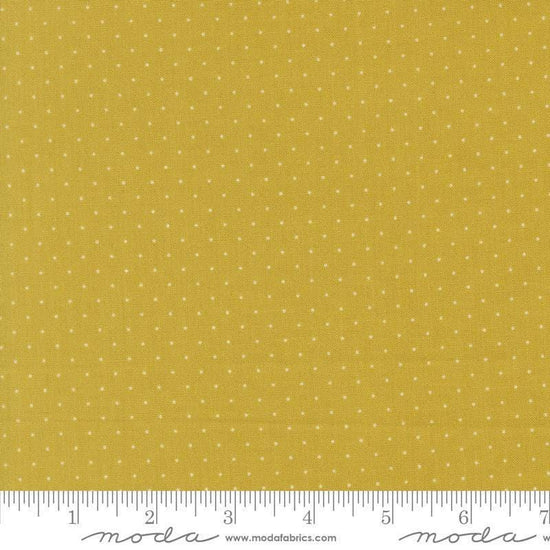 Image of Butternut and Sage Pindot Citron quilting cotton fabric by Fig Tree Co for Moda Fabrics. Features polka dots on a green background. Cute Little Fabric Shop.