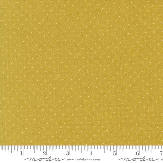 Image of Butternut and Sage Pindot Citron quilting cotton fabric by Fig Tree Co for Moda Fabrics. Features polka dots on a green background. Cute Little Fabric Shop.