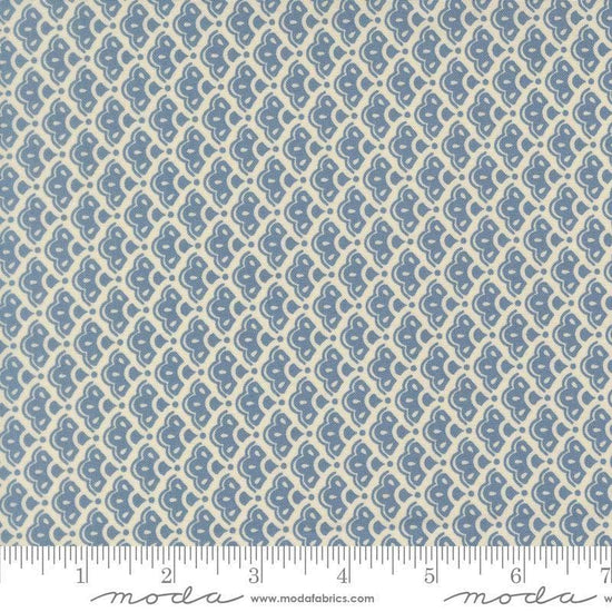 Image of Butternut and Sage Cobblestone Dusk quilting cotton fabric by Fig Tree Co for Moda Fabrics. Features a geometric pattern on a blue background. Cute Little Fabric Shop.