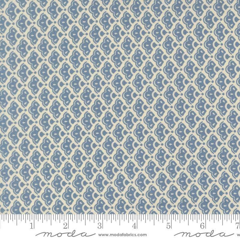 Image of Butternut and Sage Cobblestone Dusk quilting cotton fabric by Fig Tree Co for Moda Fabrics. Features a geometric pattern on a blue background. Cute Little Fabric Shop.