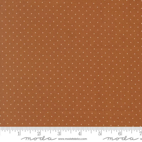 Image of Butternut and Sage Pindot Cinnamon quilting cotton fabric by Fig Tree Co for Moda Fabrics. Features polka dots on a brown background. Cute Little Fabric Shop.