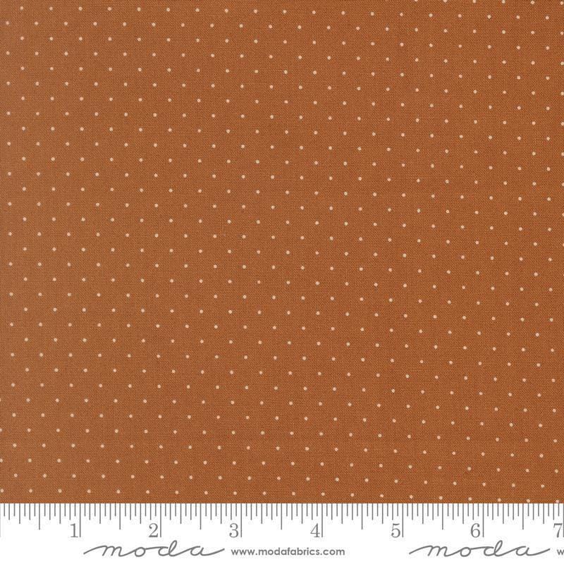 Image of Butternut and Sage Pindot Cinnamon quilting cotton fabric by Fig Tree Co for Moda Fabrics. Features polka dots on a brown background. Cute Little Fabric Shop.