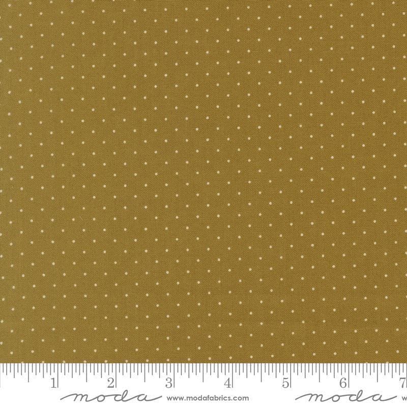 Image of Butternut and Sage Pindot Olive quilting cotton fabric by Fig Tree Co for Moda Fabrics. Features polka dots on a green background. Cute Little Fabric Shop.