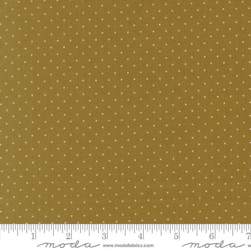 Image of Butternut and Sage Pindot Olive quilting cotton fabric by Fig Tree Co for Moda Fabrics. Features polka dots on a green background. Cute Little Fabric Shop.