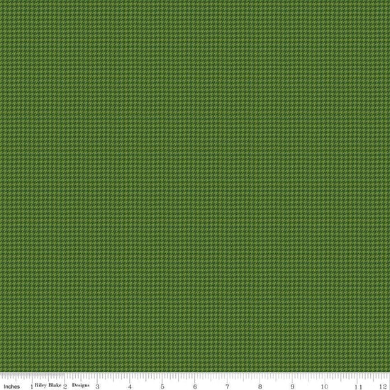 Image of Cozy Autumn Houndstooth Olive quilting cotton fabric by Beverly McCullough for Riley Blake Designs. Features houndstooth on a green background. Cute Little Fabric Shop.