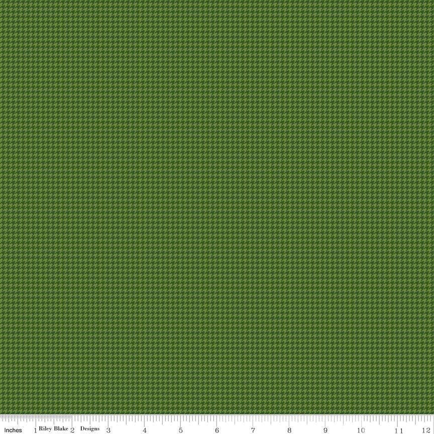 Image of Cozy Autumn Houndstooth Olive quilting cotton fabric by Beverly McCullough for Riley Blake Designs. Features houndstooth on a green background. Cute Little Fabric Shop.