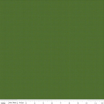 Image of Cozy Autumn Houndstooth Olive quilting cotton fabric by Beverly McCullough for Riley Blake Designs. Features houndstooth on a green background. Cute Little Fabric Shop.