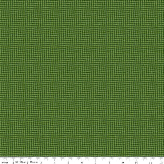 Image of Cozy Autumn Houndstooth Olive quilting cotton fabric by Beverly McCullough for Riley Blake Designs. Features houndstooth on a green background. Cute Little Fabric Shop.
