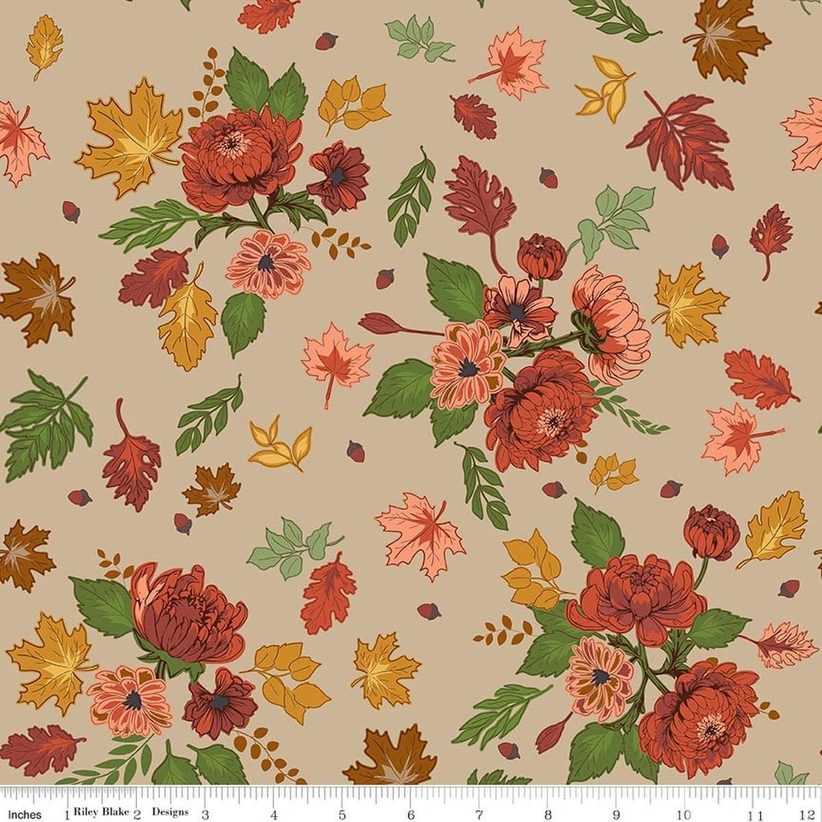 Image of Cozy Autumn Main Palomino quilting cotton fabric by Beverly McCullough for Riley Blake Designs. Features flowers on a gray background. Cute Little Fabric Shop.
