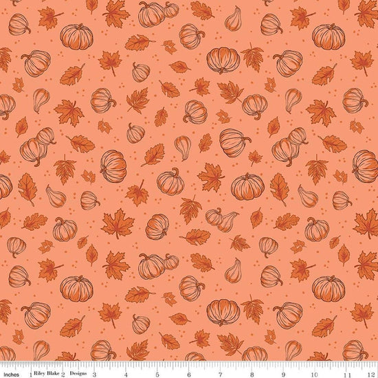 Image of Cozy Autumn Pumpkins Melon quilting cotton fabric by Beverly McCullough for Riley Blake Designs. Features pumpkins and leaves on a pinky orange background. Cute Little Fabric Shop.