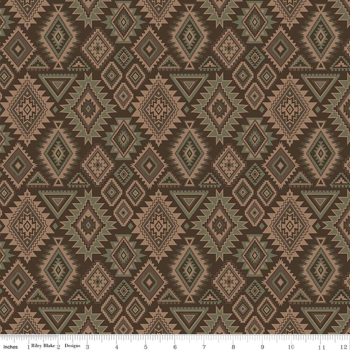 Image of Whispering Pines Geometric Brown quilting cotton fabric by The RBD Designers for Riley Blake Designs. Features a geometric pattern on a brown background. Cute Little Fabric Shop.