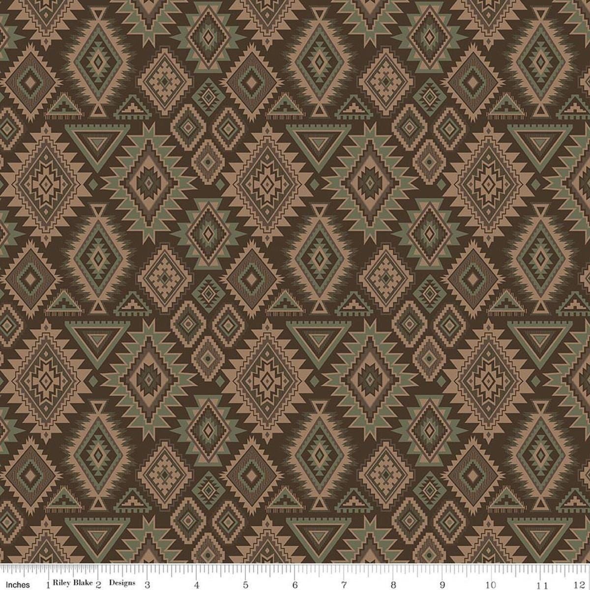 Image of Whispering Pines Geometric Brown quilting cotton fabric by The RBD Designers for Riley Blake Designs. Features a geometric pattern on a brown background. Cute Little Fabric Shop.