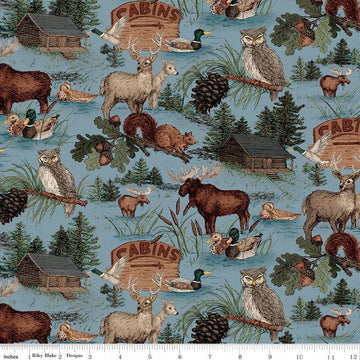 Image of Whispering Pines Main Blue quilting cotton fabric by The RBD Designers for Riley Blake Designs. Features animals on a blue background. Cute Little Fabric Shop.