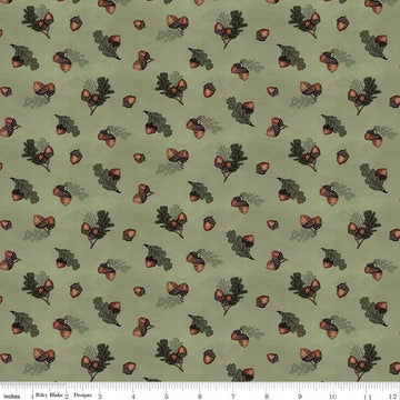 Image of Whispering Pines Acorns Green quilting cotton fabric by The RBD Designers for Riley Blake Designs. Features acorns and leaves on a green background. Cute Little Fabric Shop.