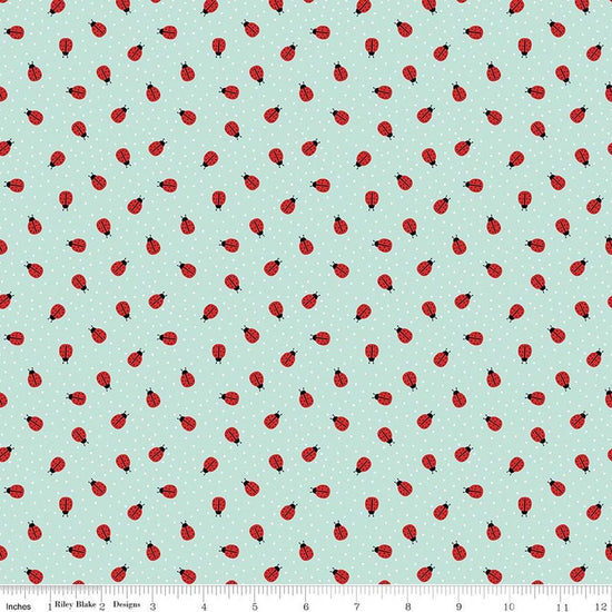 Image of Little Ladybug Ladybugs Blue quilting cotton fabric by Lori Whitlock for Riley Black Designs. Features ladybugs on a blue background. Cute Little Fabric Shop.