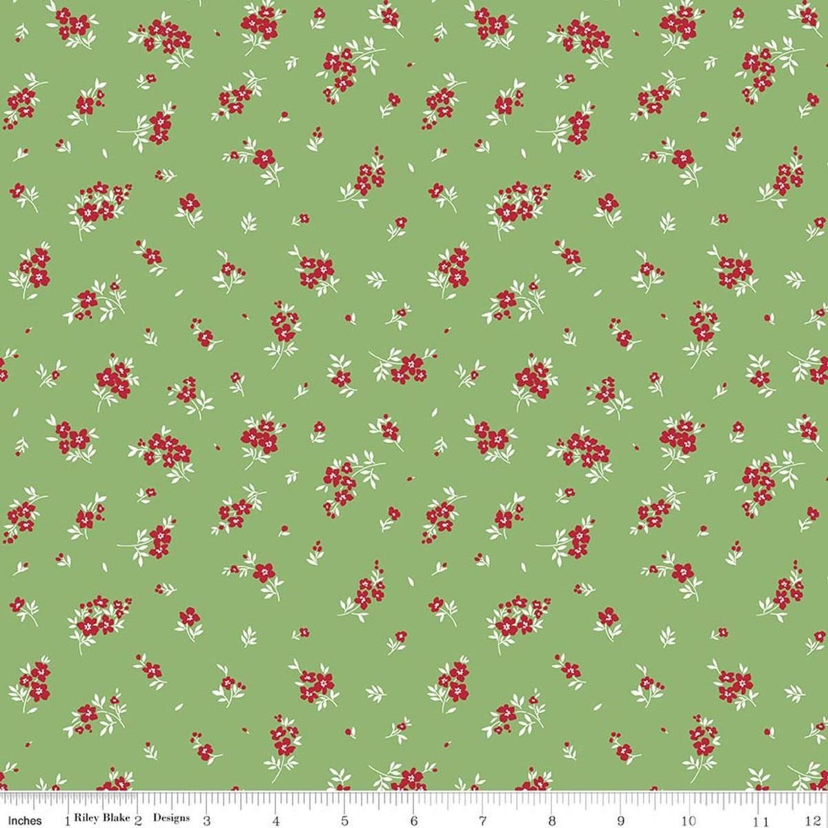 Image of Little Ladybug Mini Flowers Green quilting cotton fabric by Lori Whitlock for Riley Black Designs. Features flowers on a green background. Cute Little Fabric Shop.