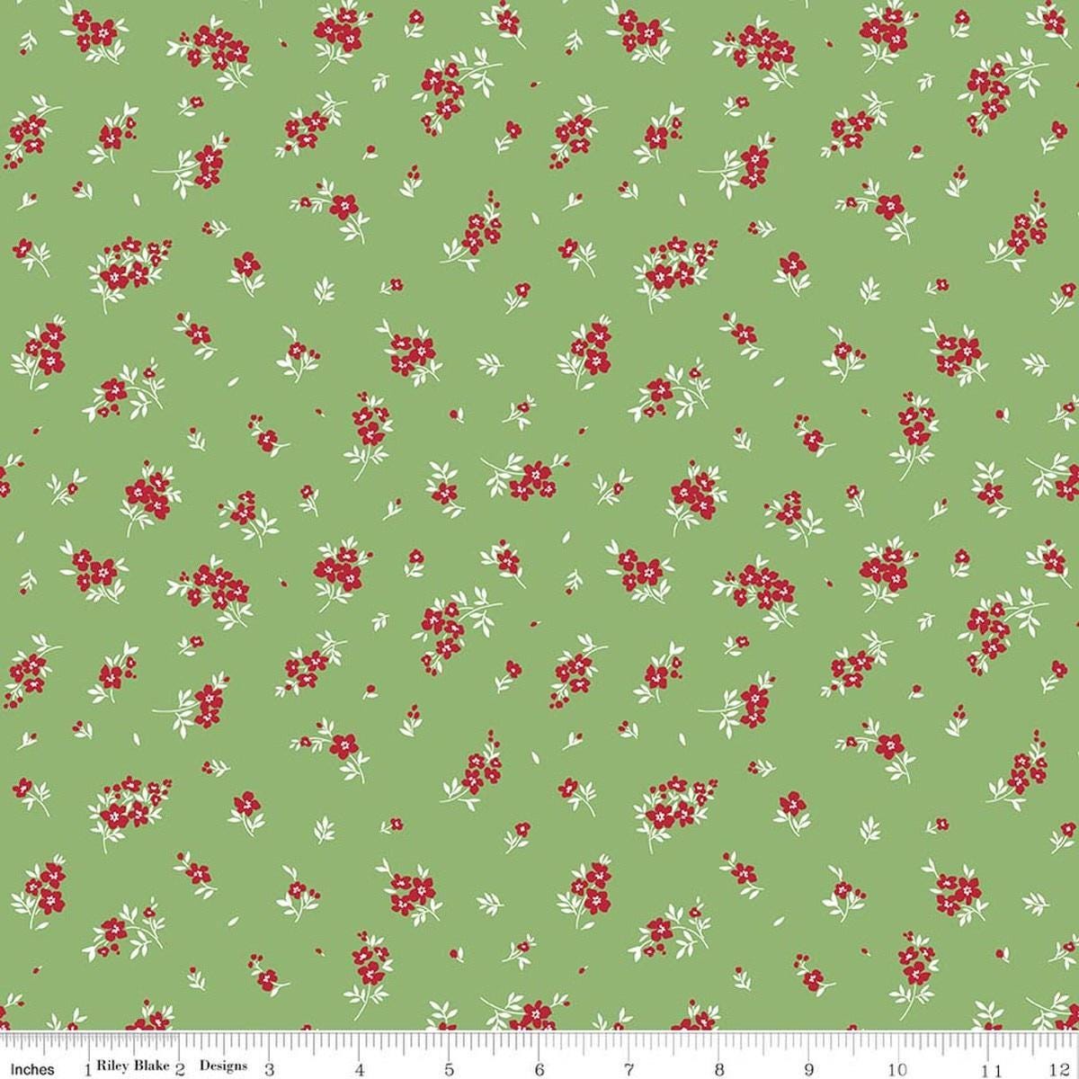Image of Little Ladybug Mini Flowers Green quilting cotton fabric by Lori Whitlock for Riley Black Designs. Features flowers on a green background. Cute Little Fabric Shop.