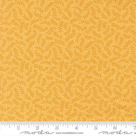 Image of My Secret Garden Crawling Vines Sunflower quilting cotton fabric by Stacy Iest Hsu for Moda Fabrics. Features leaves on a yellow background. Cute Little Fabric Shop.