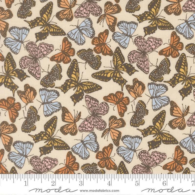 Image of My Secret Garden Flitter Flutter Cloud quilting cotton fabric by Stacy Iest Hsu for Moda Fabrics. Features butterflies on a cream background. Cute Little Fabric Shop.