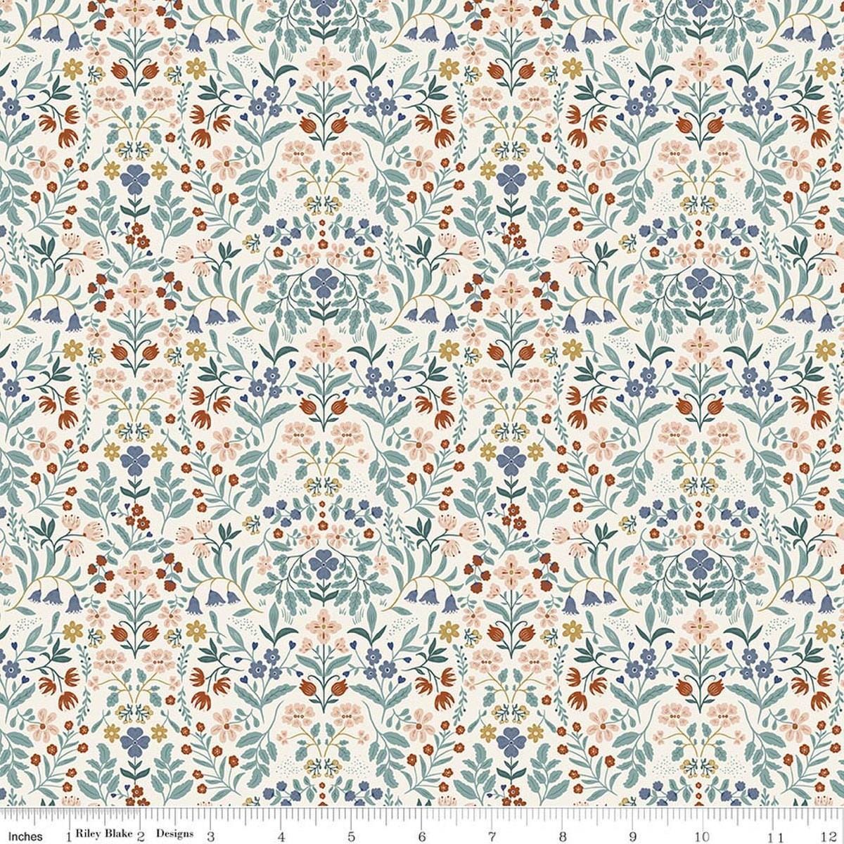 Image of Before the Blooms Iris Cream quilting cotton fabric by Danelys Sidron for Riley Blake Designs. Features flowers on a white background. Cute Little Fabric Shop.