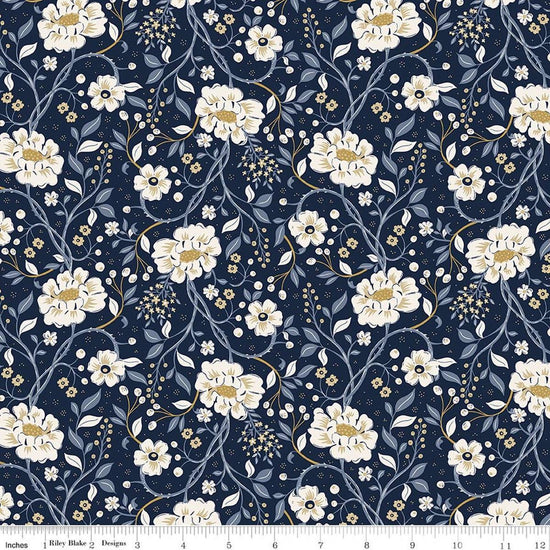 Image of Before the Blooms Main Indigo quilting cotton fabric by Danelys Sidron for Riley Blake Designs. Features flowers on a blue background. Cute Little Fabric Shop.