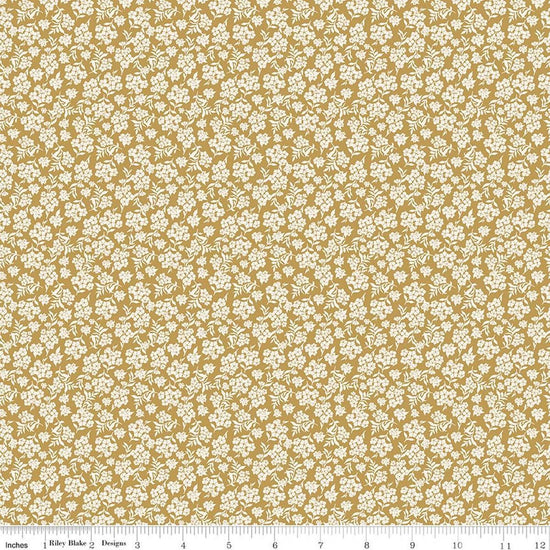 Image of Before the Blooms Viola Gold quilting cotton fabric by Danelys Sidron for Riley Blake Designs. Features flowers on a gold background. Cute Little Fabric Shop.