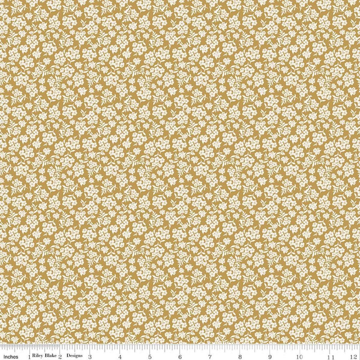 Image of Before the Blooms Viola Gold quilting cotton fabric by Danelys Sidron for Riley Blake Designs. Features flowers on a gold background. Cute Little Fabric Shop.