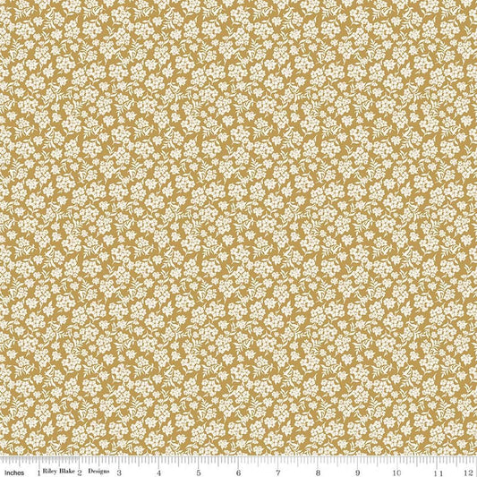 Image of Before the Blooms Viola Gold quilting cotton fabric by Danelys Sidron for Riley Blake Designs. Features flowers on a gold background. Cute Little Fabric Shop.