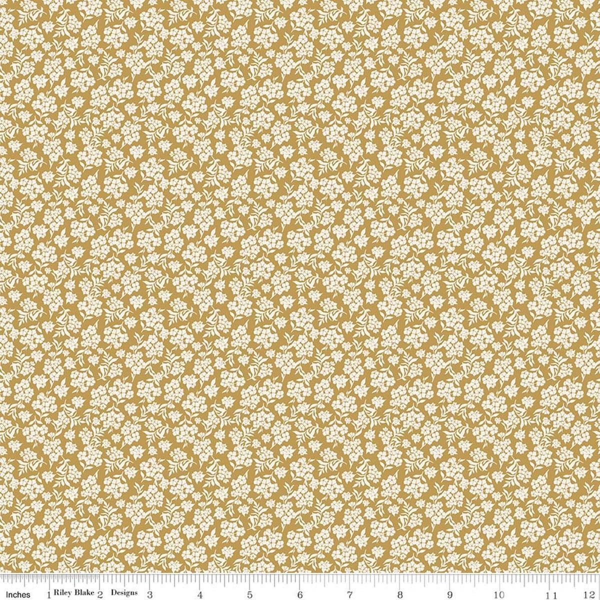 Image of Before the Blooms Viola Gold quilting cotton fabric by Danelys Sidron for Riley Blake Designs. Features flowers on a gold background. Cute Little Fabric Shop.