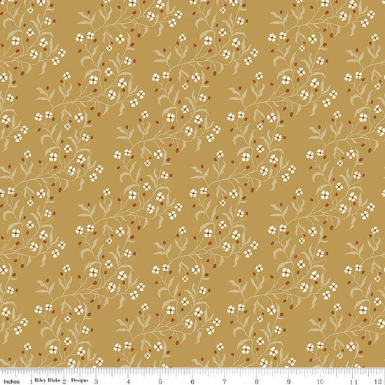 Image of Before the Blooms Astrid Gold quilting cotton fabric by Danelys Sidron for Riley Blake Designs. Features flowers on a gold background. Cute Little Fabric Shop.