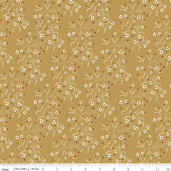 Image of Before the Blooms Astrid Gold quilting cotton fabric by Danelys Sidron for Riley Blake Designs. Features flowers on a gold background. Cute Little Fabric Shop.