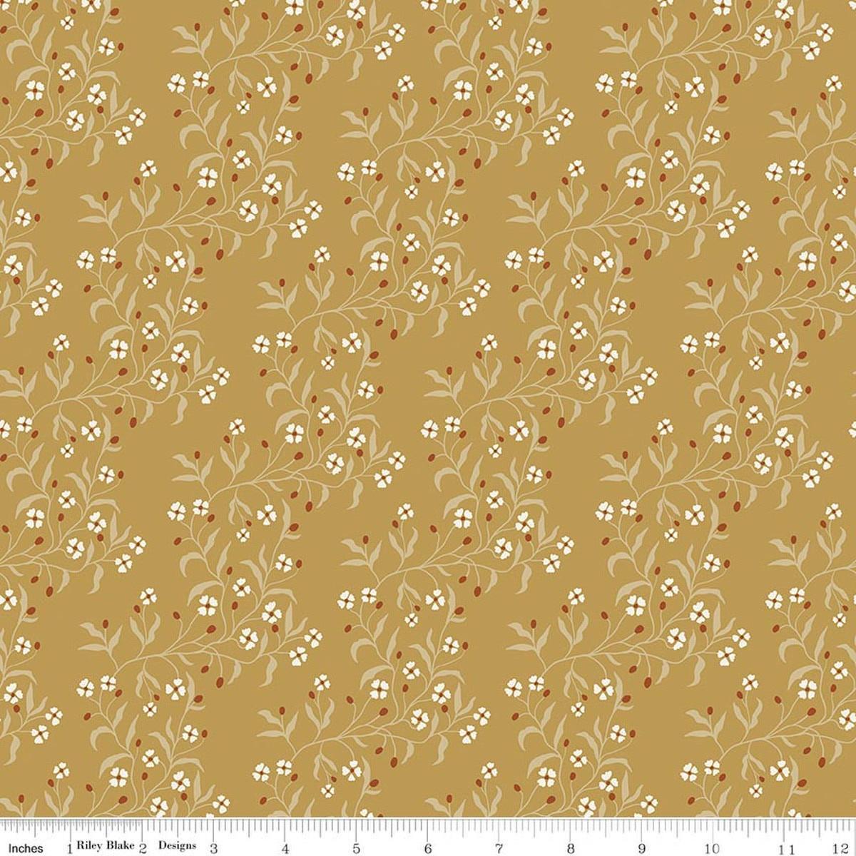 Image of Before the Blooms Astrid Gold quilting cotton fabric by Danelys Sidron for Riley Blake Designs. Features flowers on a gold background. Cute Little Fabric Shop.