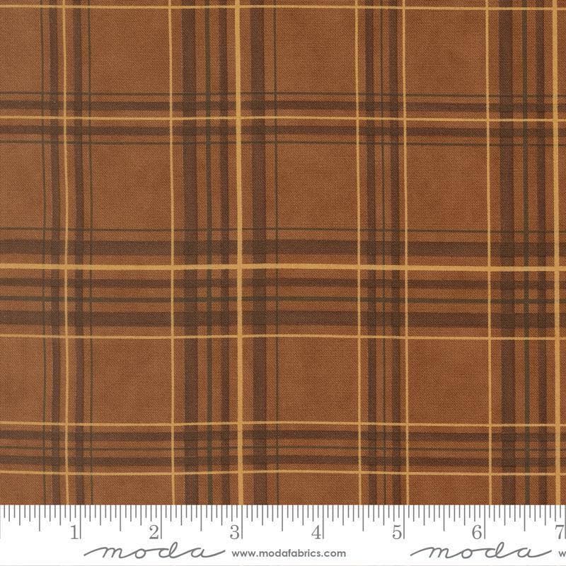 Image of Northwoods Lodge Plaid Bark quilting cotton fabric by Deb Strain for Moda Fabrics. Features plaid on a brown background. Cute Little Fabric Shop.