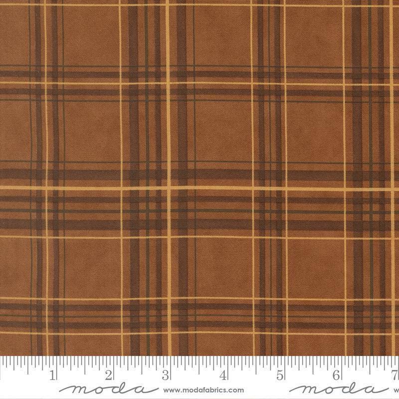Image of Northwoods Lodge Plaid Bark quilting cotton fabric by Deb Strain for Moda Fabrics. Features plaid on a brown background. Cute Little Fabric Shop.