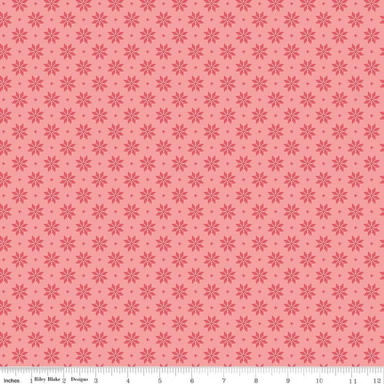Image of Foxglove Stars Grapefruit quilting cotton fabric by Jill Finley for Riley Blake Designs. Features stars on a pink background. Cute Little Fabric Shop.