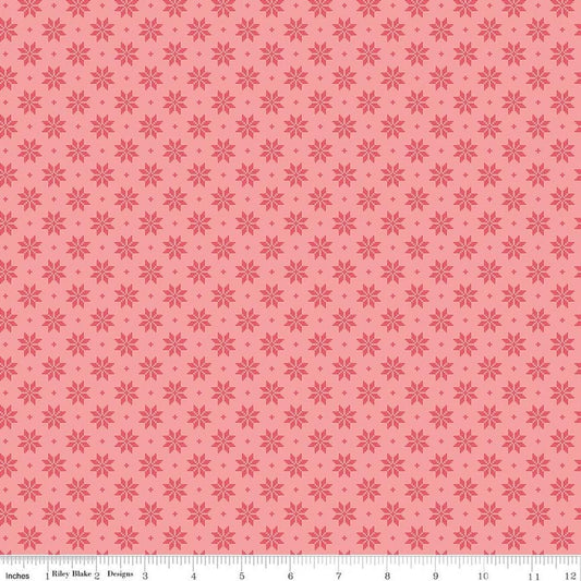 Image of Foxglove Stars Grapefruit quilting cotton fabric by Jill Finley for Riley Blake Designs. Features stars on a pink background. Cute Little Fabric Shop.