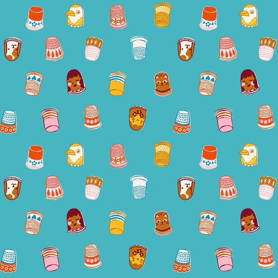 Image of 1 800 Notion Thimbles Turquoise quilting cotton fabric by Ruby Star Society for Moda Fabrics. Features sewing accessories on a blue background. Cute Little Fabrics Shop.